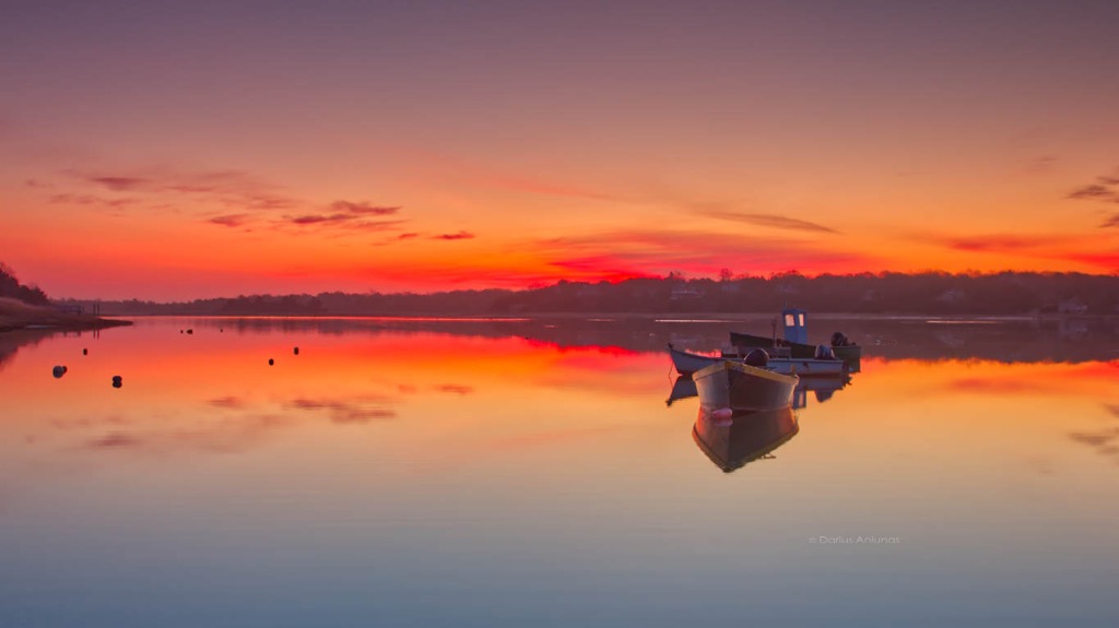 Cape Cod spring photos: Boat reflections at the Cove in Eastham, Massachusetts.