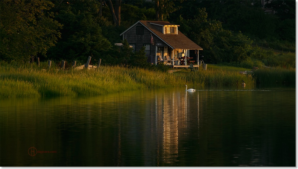 Cape Cod cottage. Photograph of Orleans, Massachusetts town Cove and cottage by photographer Dapixara.