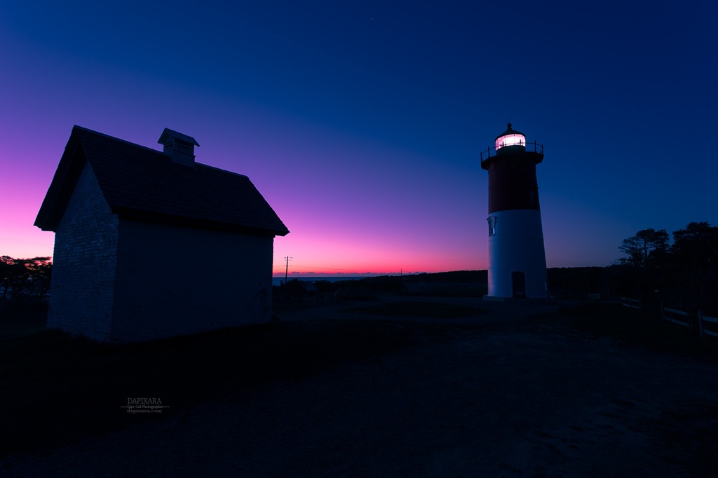 Today's sunrise! The Nauset Lighthouse was silhouetted against the sky. Nauset Lighthouse, Eastham, Cape Cod. Photo by Dapixara. https://dapixara.com