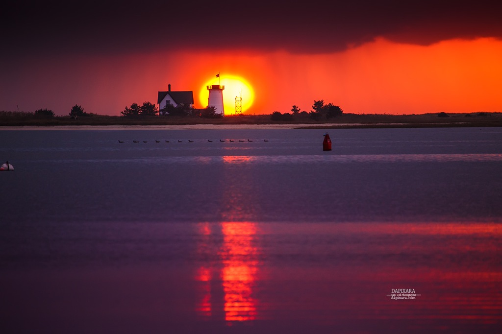 Stage Harbor Lighthouse in Chatham at Sunset. Photo Of The Day! Tonight's Big Sunset and Rain Clouds From Chatham Cape Cod Over Stage Harbor Lighthouse. Photo by Dapixara https://dapixara.com