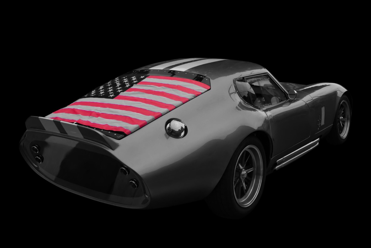 Shelby Daytona. American flag on Shelby Daytona,  America's classic car. The Shelby Daytona Coupe (also referred to as the Shelby Daytona Cobra Coupe) is an American sports-coupé. Black and white photography print for sale by Darius. A - DAPIXARA.
BUY PRINT
