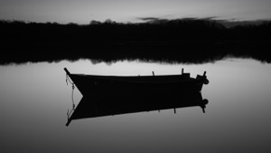 Row Boat Silhouette Reflection. Black and white prints. Black and white serene scenes for sale by Dapixara.